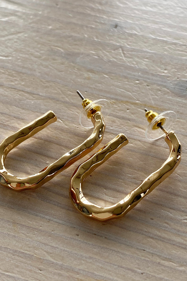 Earrings gold stamped open shape